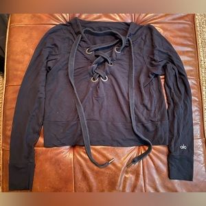 Alo Yoga woman’s lace up top